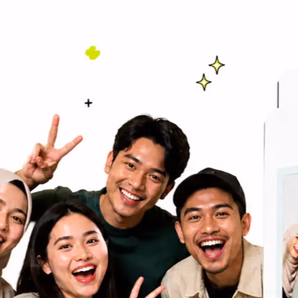 Four friends crowding the frame with peace signs